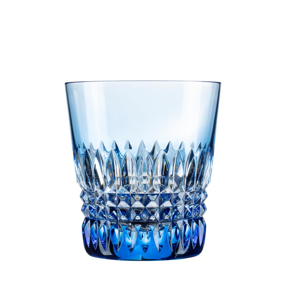 A radiant crystal drinking glass in aqua blue on a white background. Smooth and transparent light blue at the top, the lower section features rich vertical pointed cuts and a detailed diamond pattern that transitions into a deeper blue at the base.