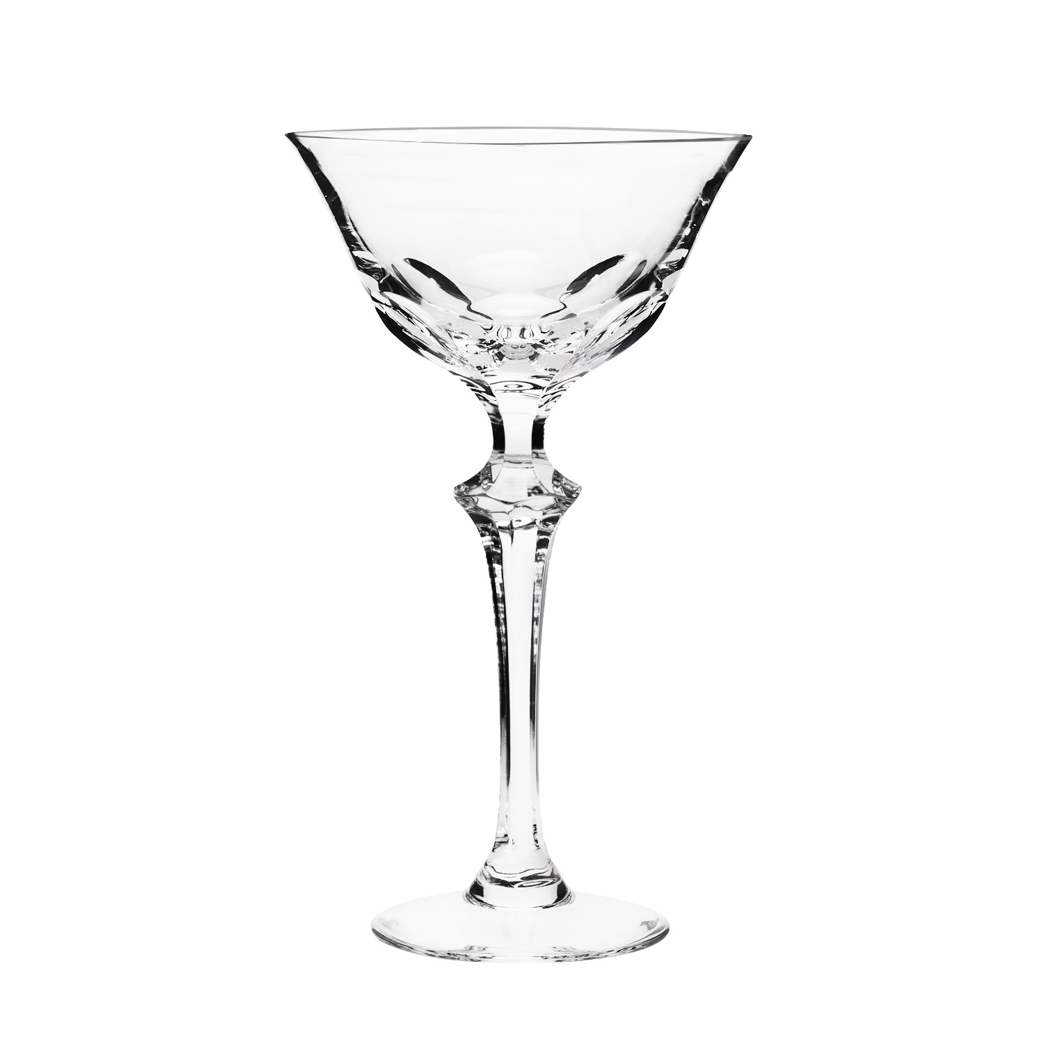 Clear crystal cocktail glass in the Palais style against a white background. Wide V-shaped bowl with artfully cut facets at the base. Elegant stem with distinctive decoration, sturdy round base.