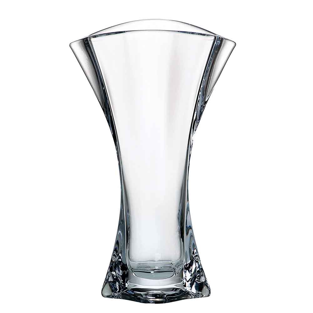 Elegant, transparent crystal vase in a clean-lined design. Slender and curved, tapering towards the centre, gently flared at the top, with a sturdy base. Finely faceted details reflect the light beautifully. A unique, hand-blown piece.