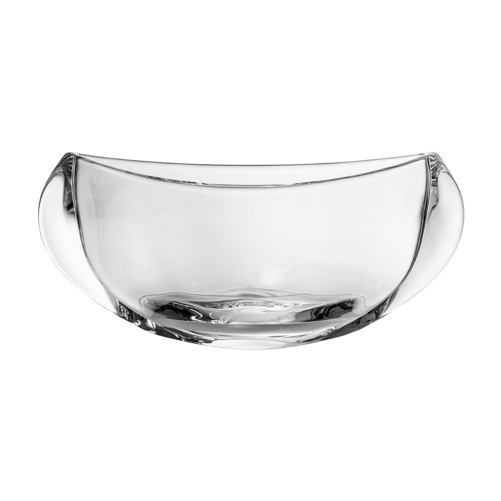 An elongated, transparent ' ARNSTADT KRISTALL ' bowl from the Cleanline series with an elegantly curved shape. Sides taper slightly towards the top; the smooth surface reflects light and highlights lead crystal quality. Oval from above.