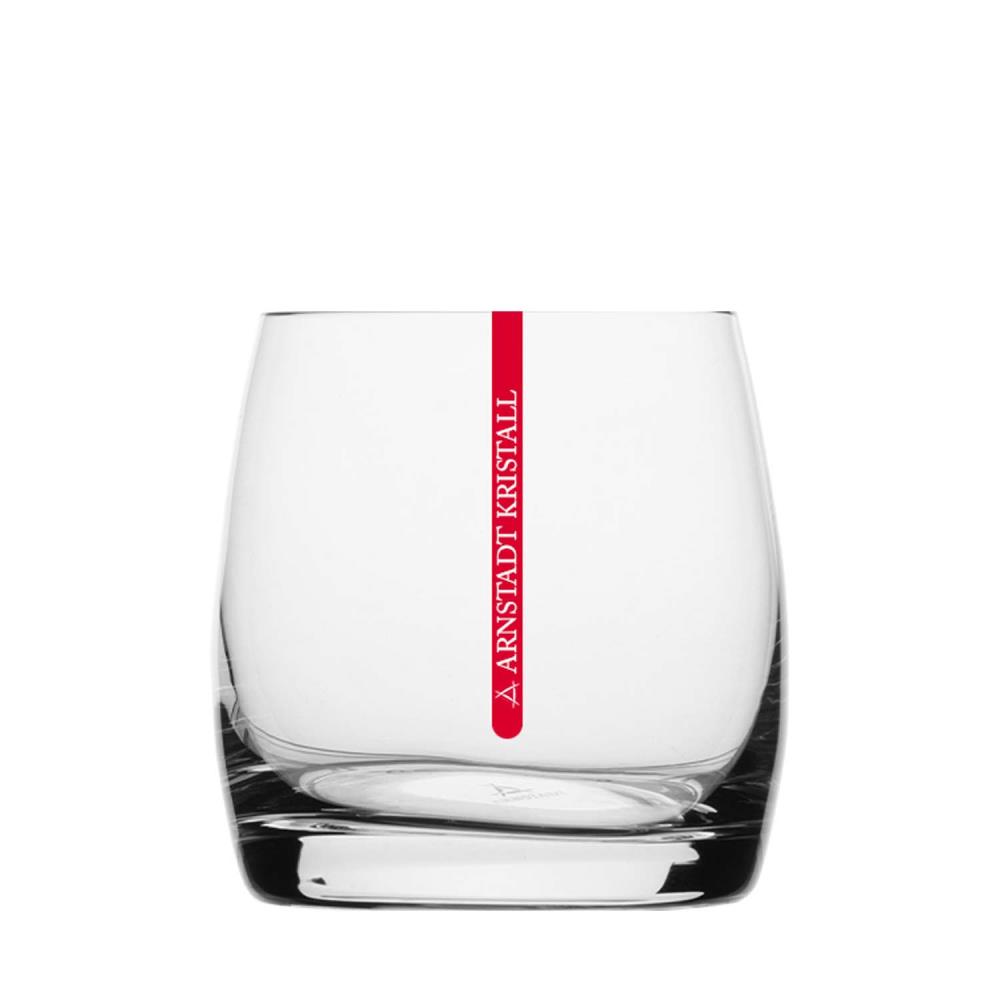 A clear crystal whisky glass featuring a striking red stripe running vertically down the side. The name ‘ARNSTADT KRISTALL ’ is written in white lettering on the red stripe. The glass has a thick base and is 8.7 cm tall, making it ideal for whisky.