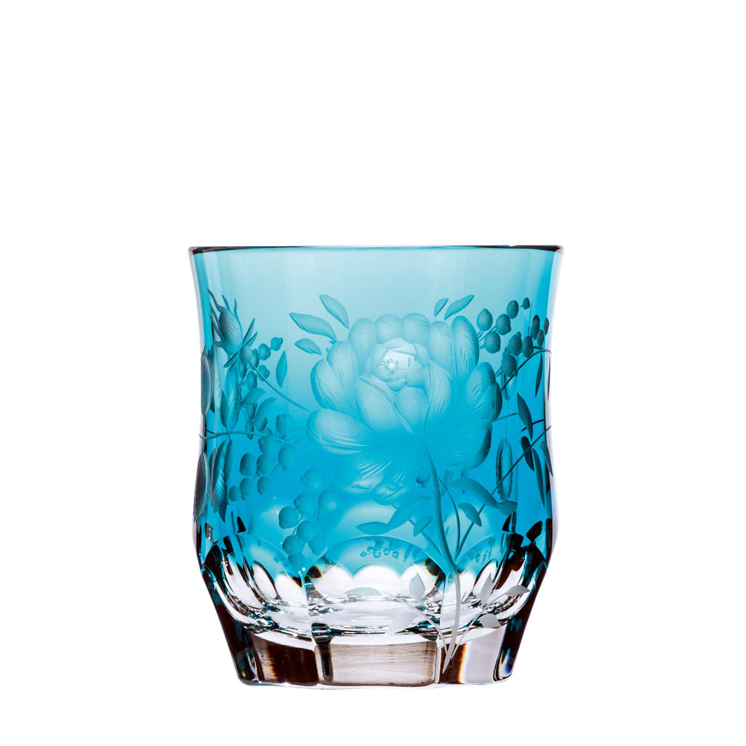 Azure blue crystal whisky glass with an intricate cut pattern featuring large flowers, surrounded by smaller leaves and berries. Sturdy, clear, faceted glass base. Luxurious ‘Primrose’ design.